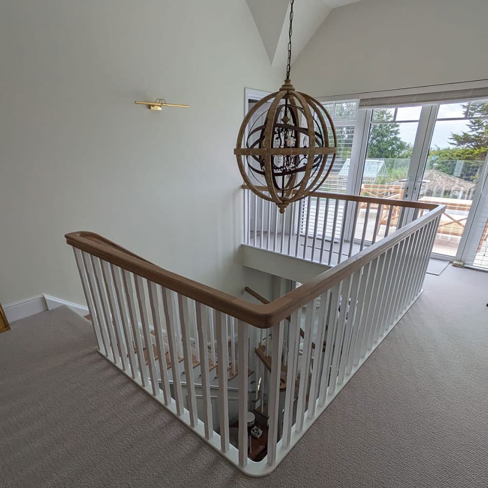 New-home staircase with timber balustrade